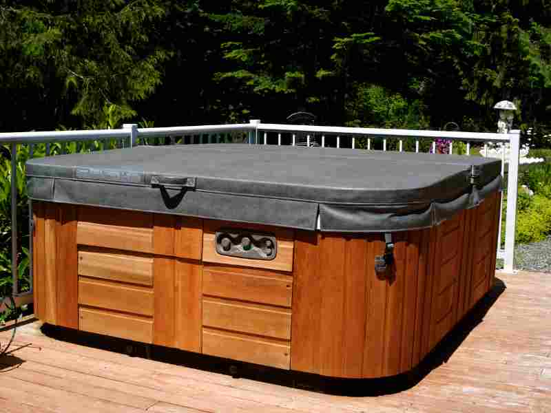 Outdoor wooden hot tub on deck